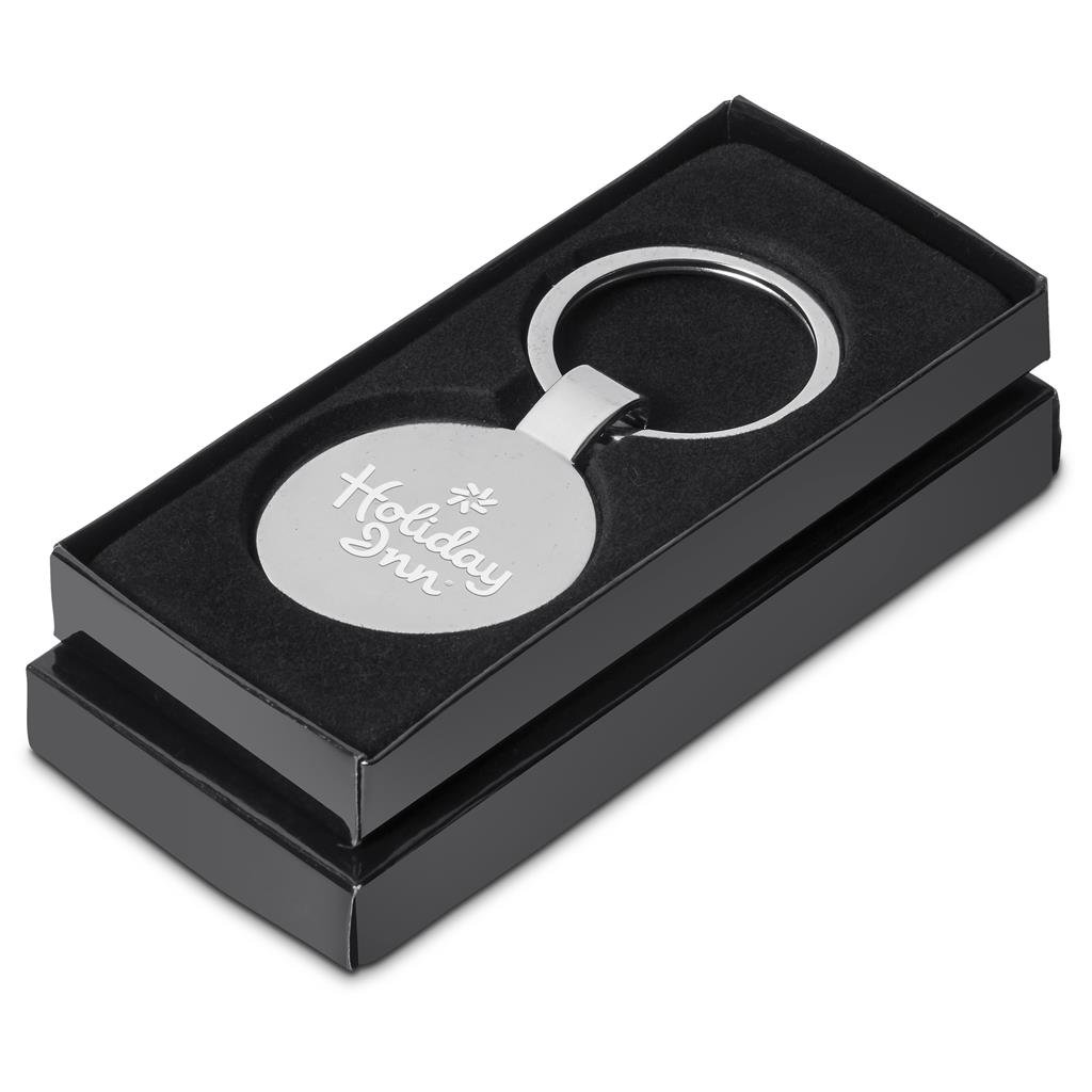 Keychain with 'Holiday Inn' engraving in a black box on a white background