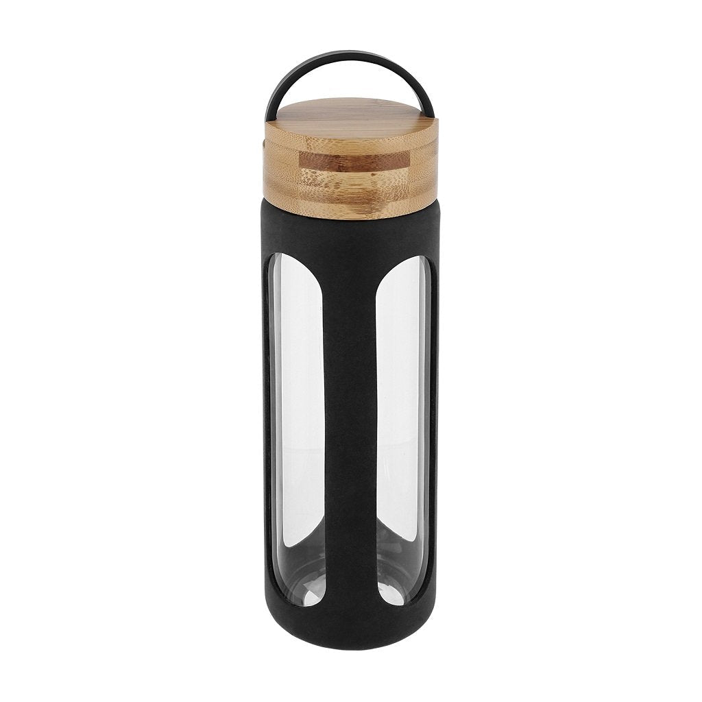 Side view of a glass bottle on a white background